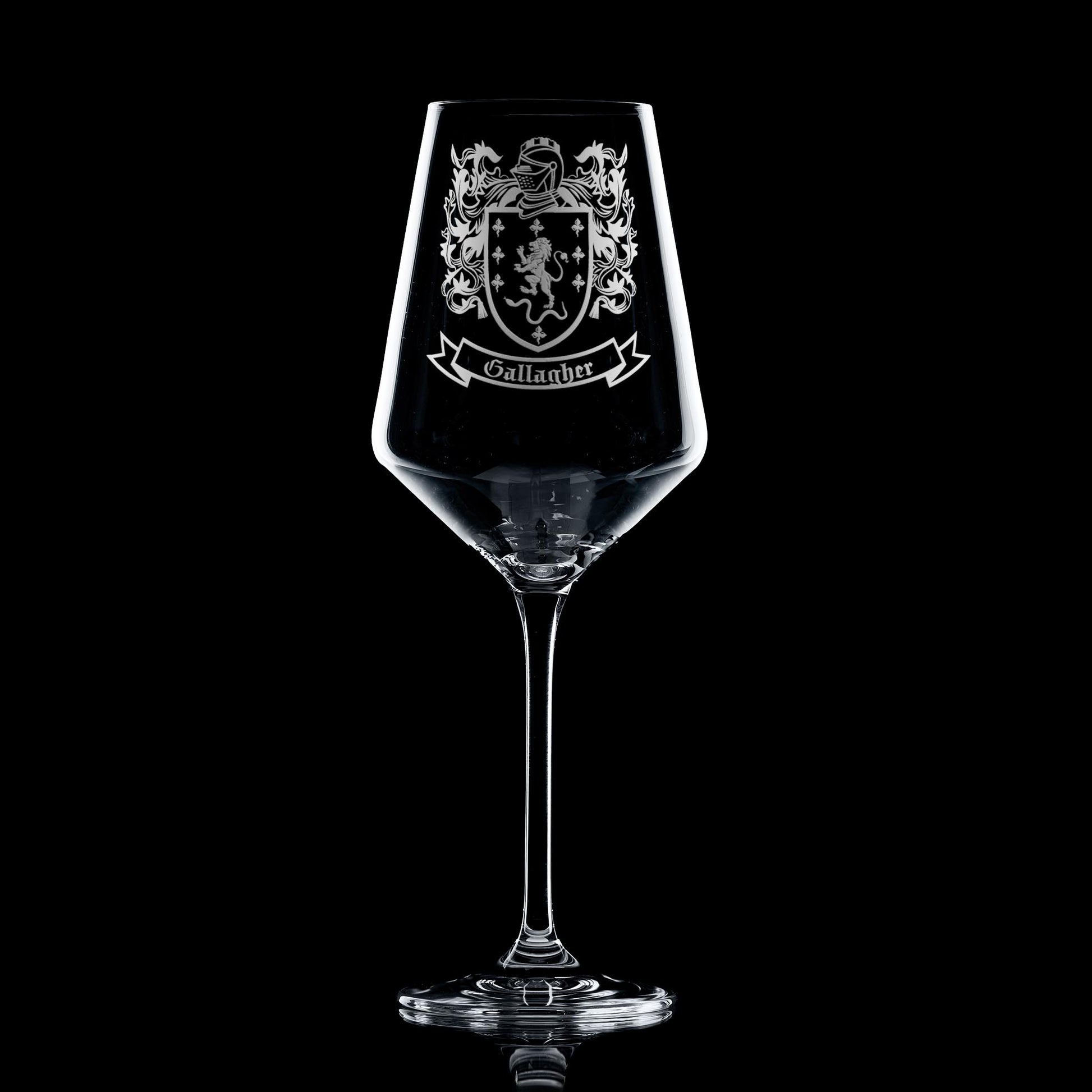 Gallagher family crest engraved on red/white wine glass — subtle, satin detail.