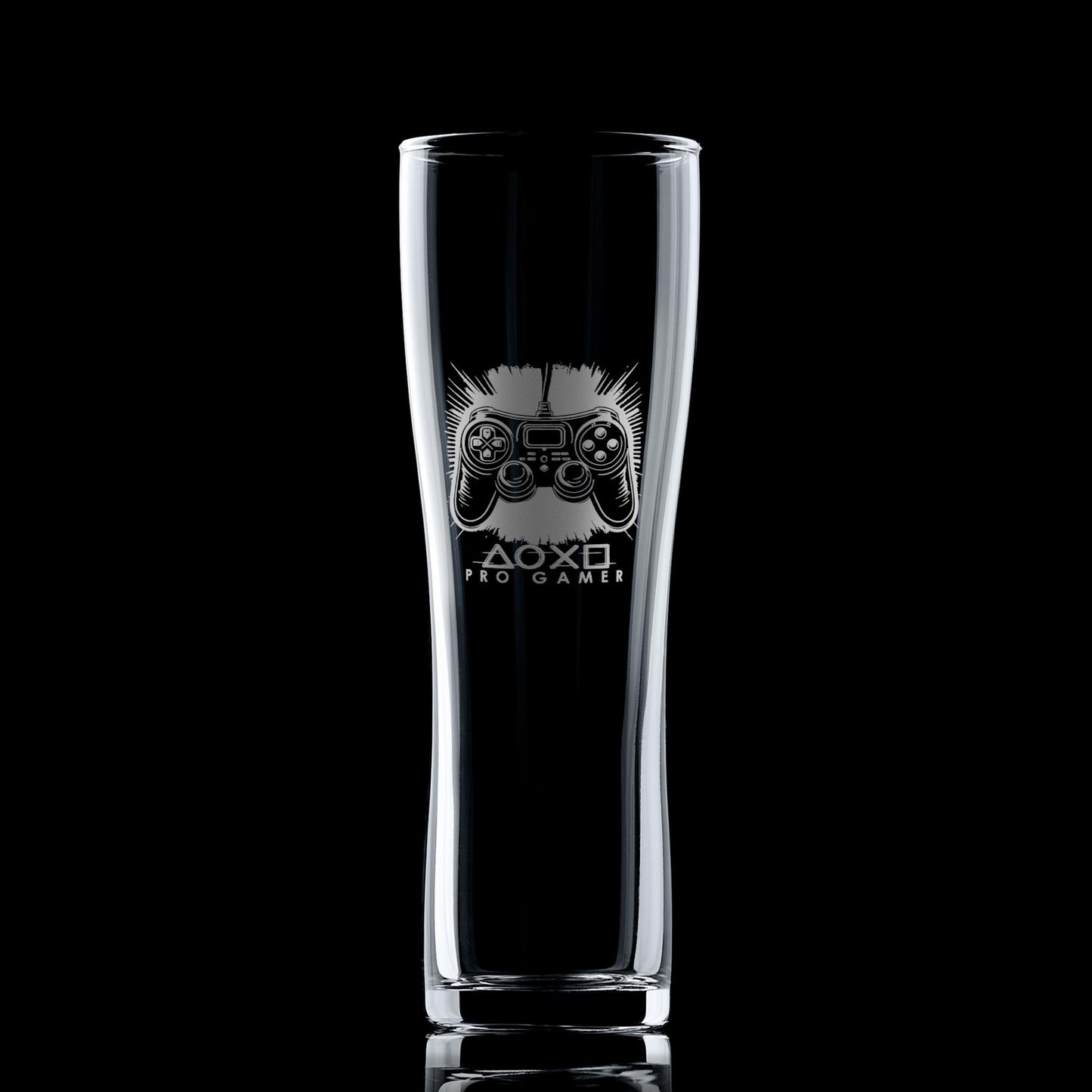 Engraved gamer pint glass featuring a controller design, shown on a black background to highlight engraving detail.