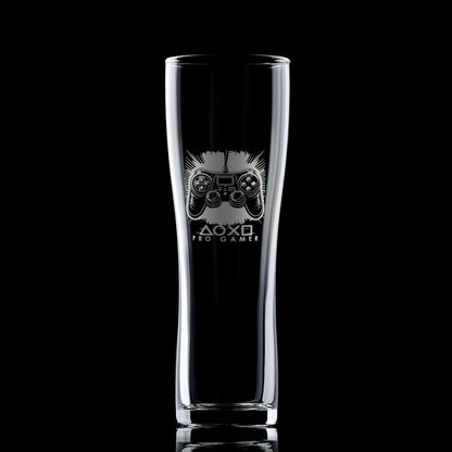 Engraved gamer pint glass featuring a controller design, shown on a black background to highlight engraving detail.