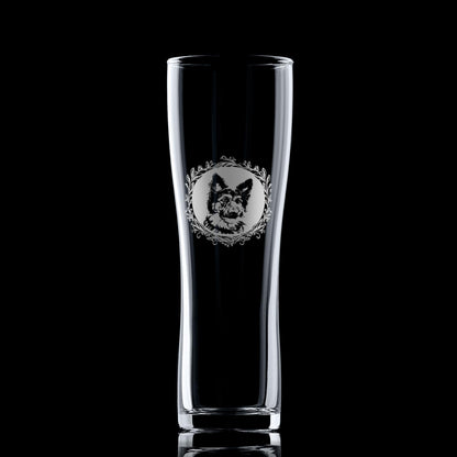 German Shepherd pint glass shown against a dark background, featuring a leafy garland portrait design.