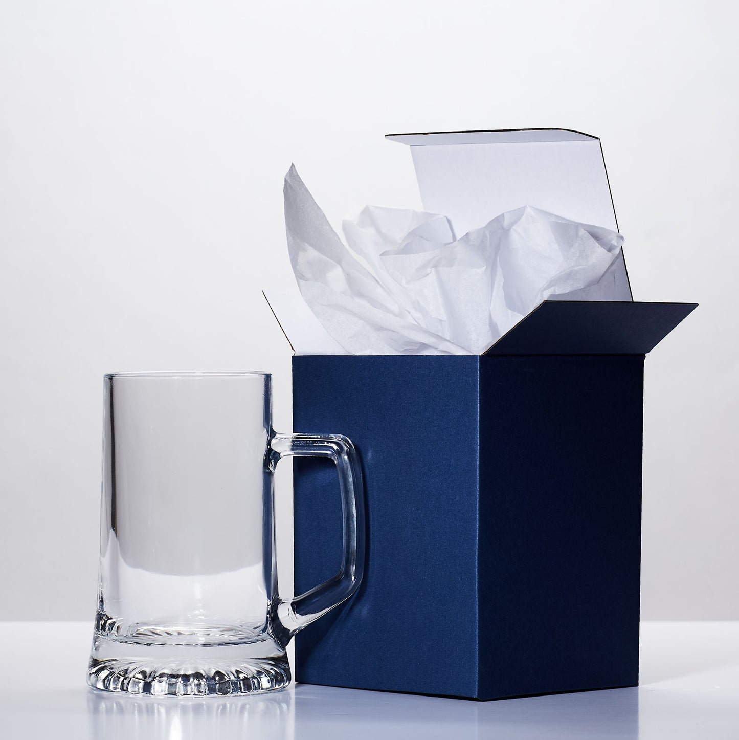 engraved glass tankard and blue cardboard gift box