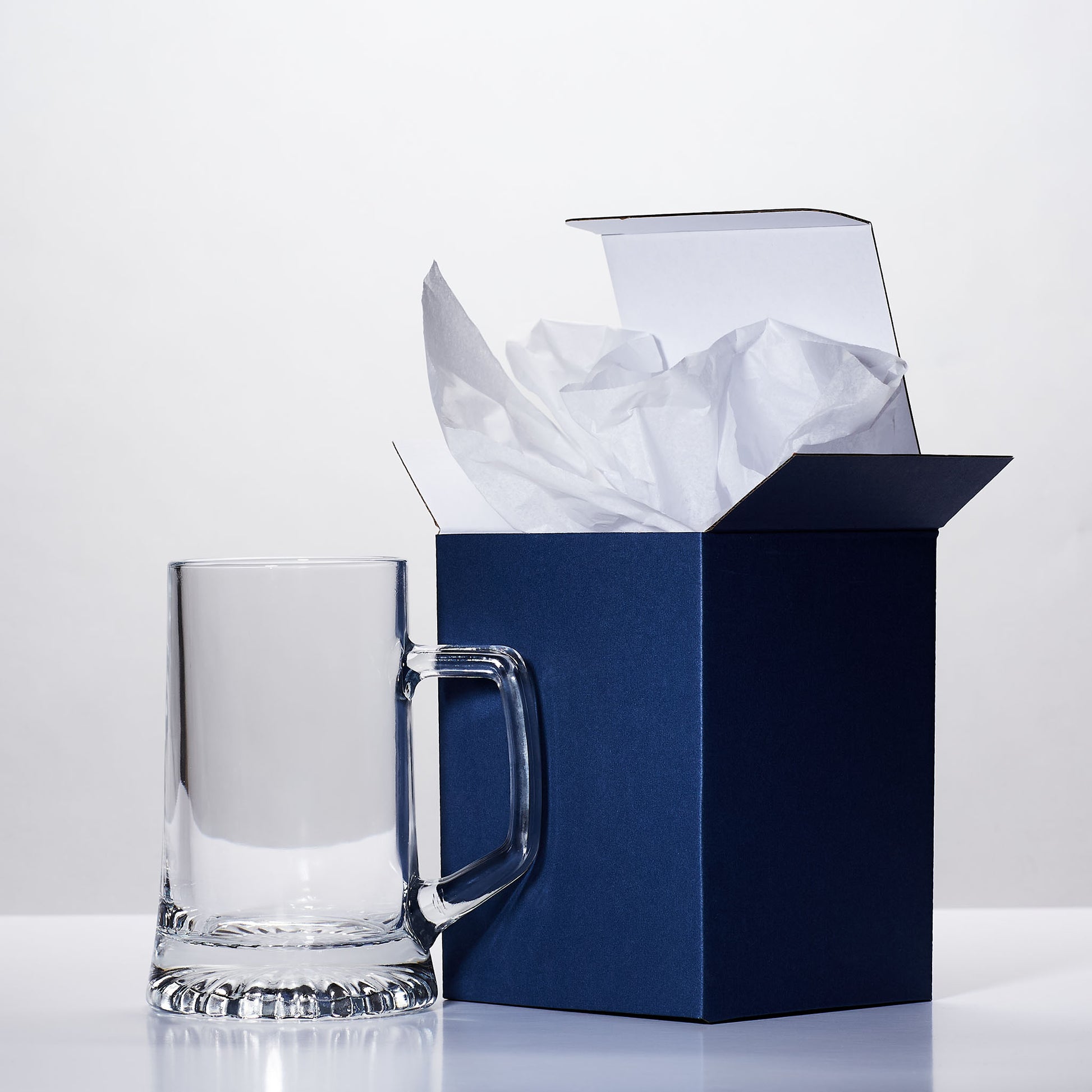 blue gift box and pint glass tankard