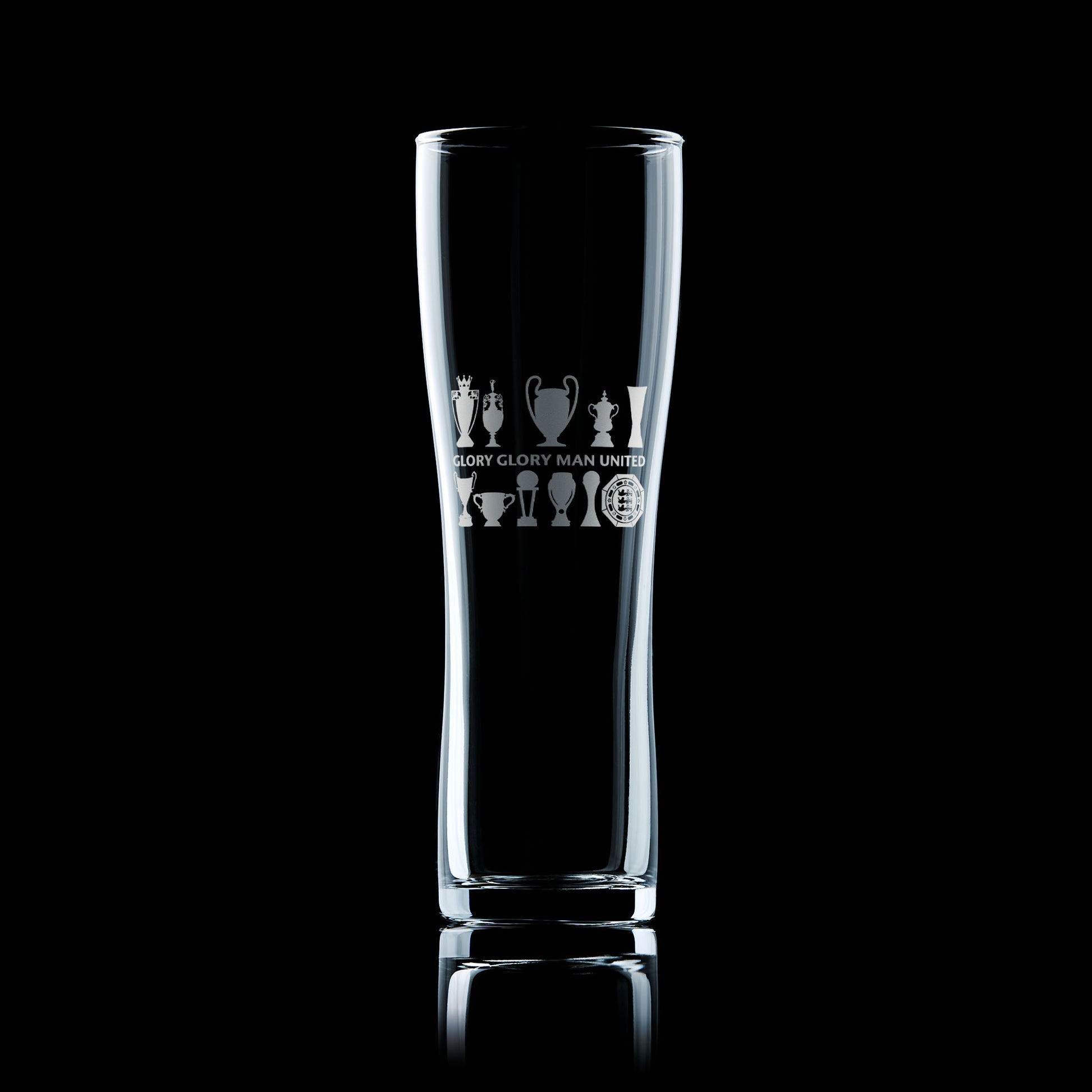 tall beer glass engraved with Manchester united Football Club trophies