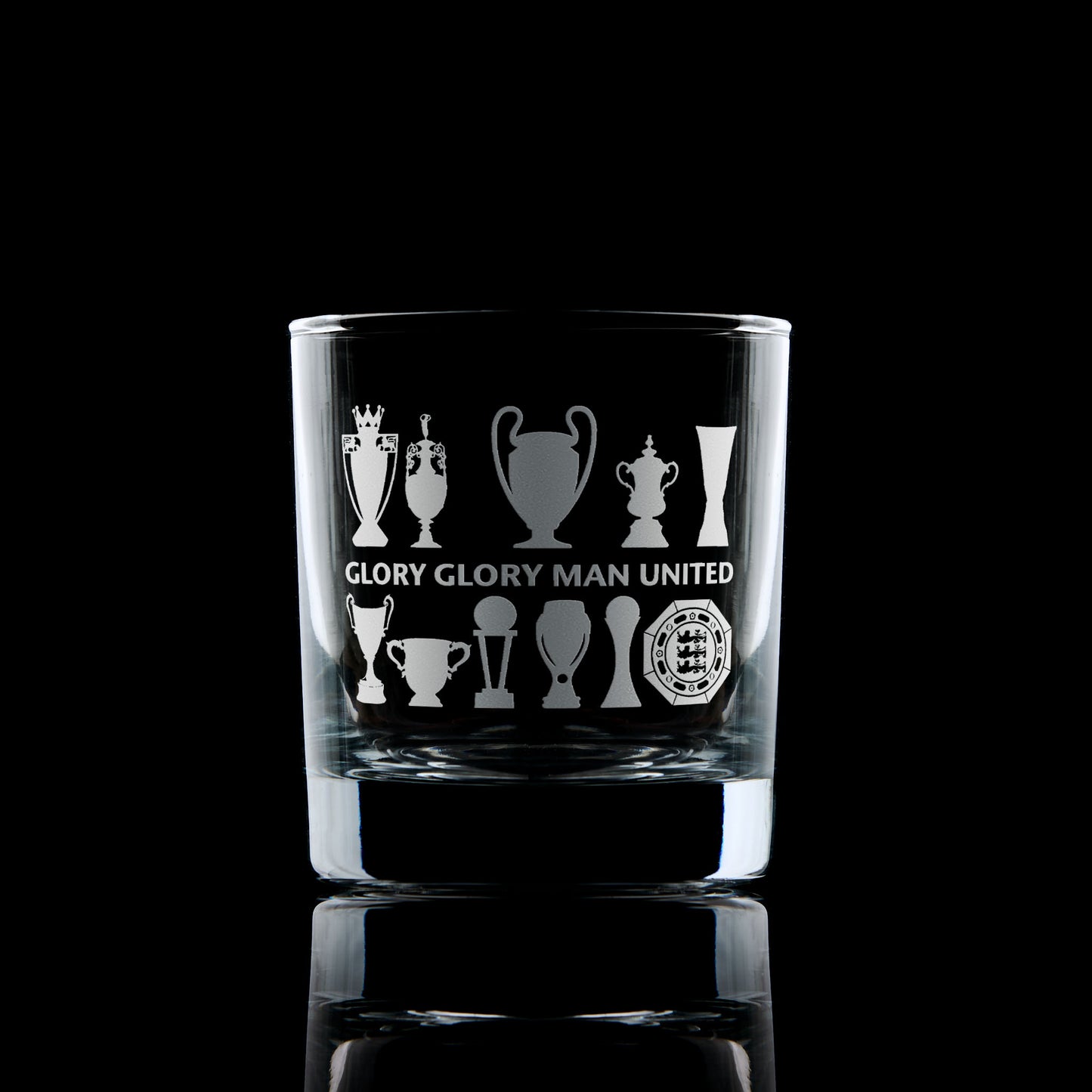 whiskey glass engraved with Manchester united Football Club trophies