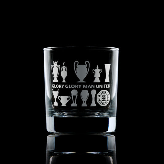 whiskey glass engraved with Manchester united Football Club trophies