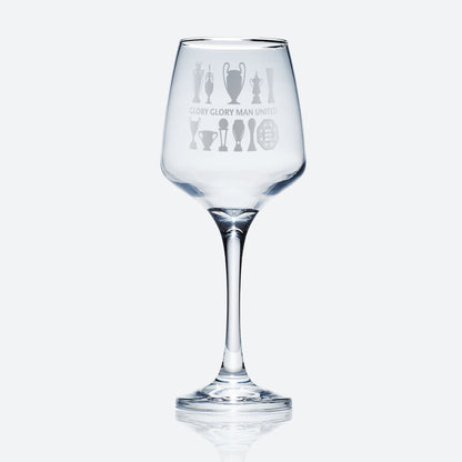 stemmed wine glass engraved with Manchester United Football Club trophies