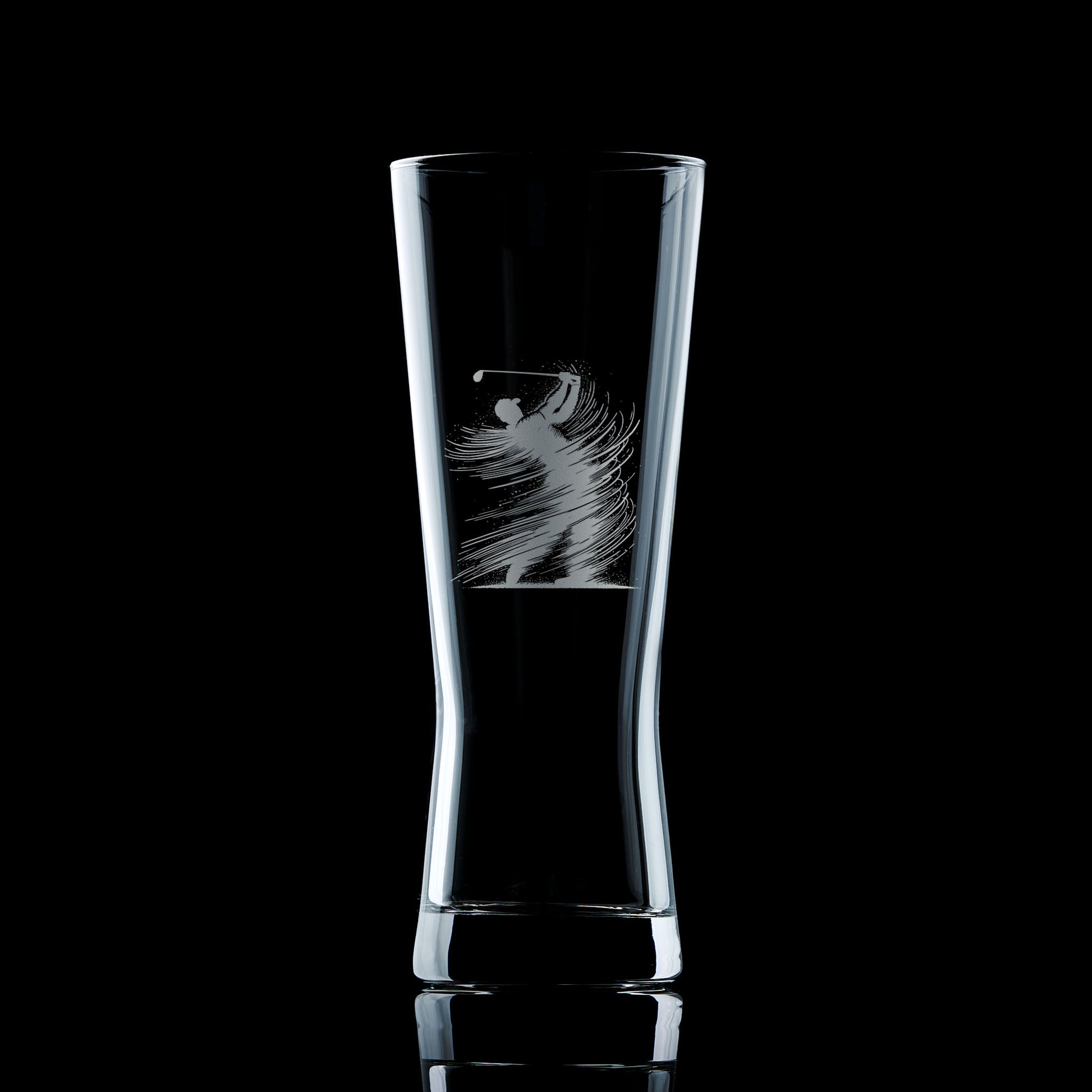 pint glass engraved with a golfer wearing a cap