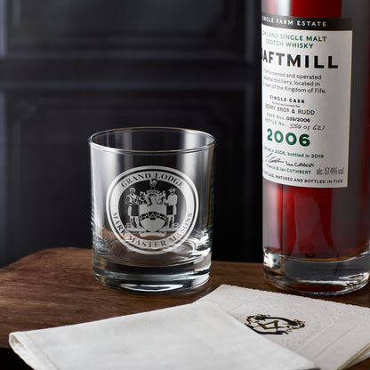 Mark Master Mason whisky glass Engraved Masonic emblem on a wooden surface