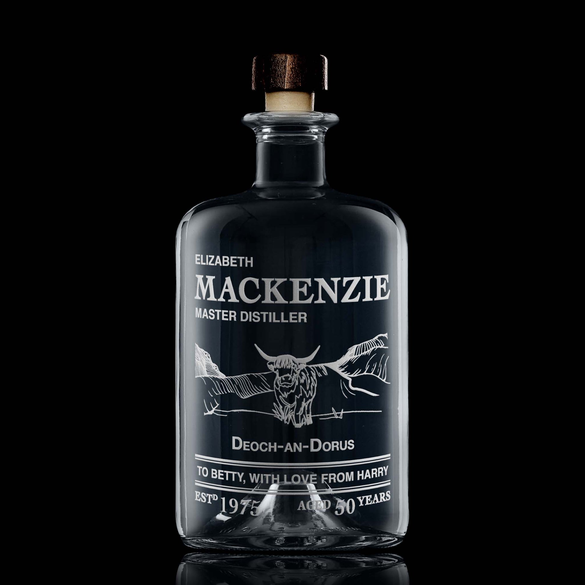 Engraved Decanter bottle featuring a Highland Coo in front of Scottish  mountains