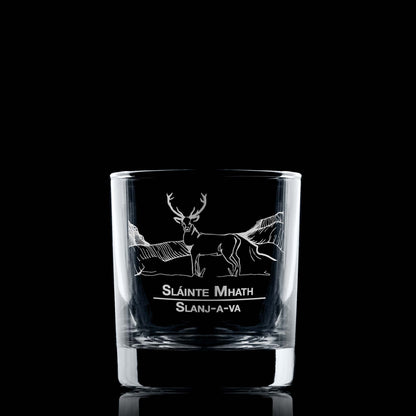 Whisky glass engraved with a Highland Stag and mountain design and featuring the words Slainte Mhath