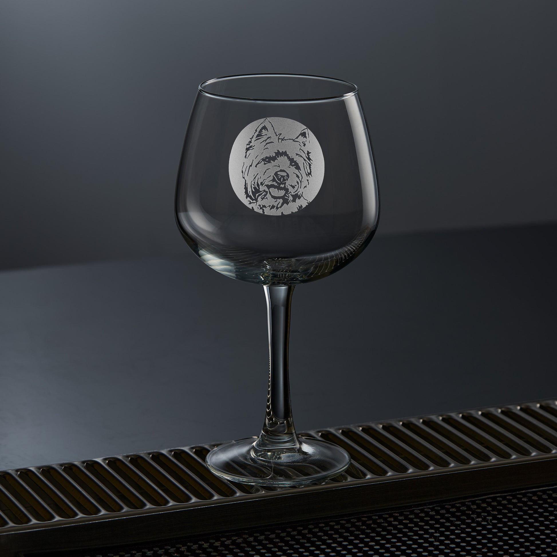 etched balloon gin glass engraved with a portrait of a highland terrier dog