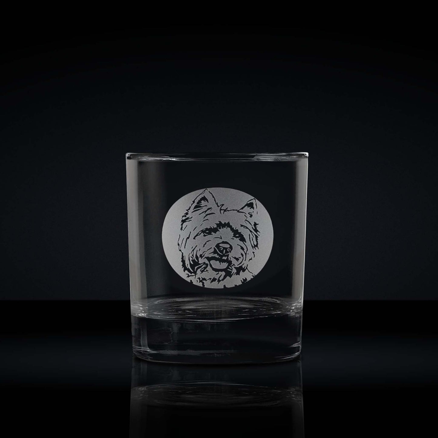 engraved whisky glass etched with a portrait of a highland terrier dog