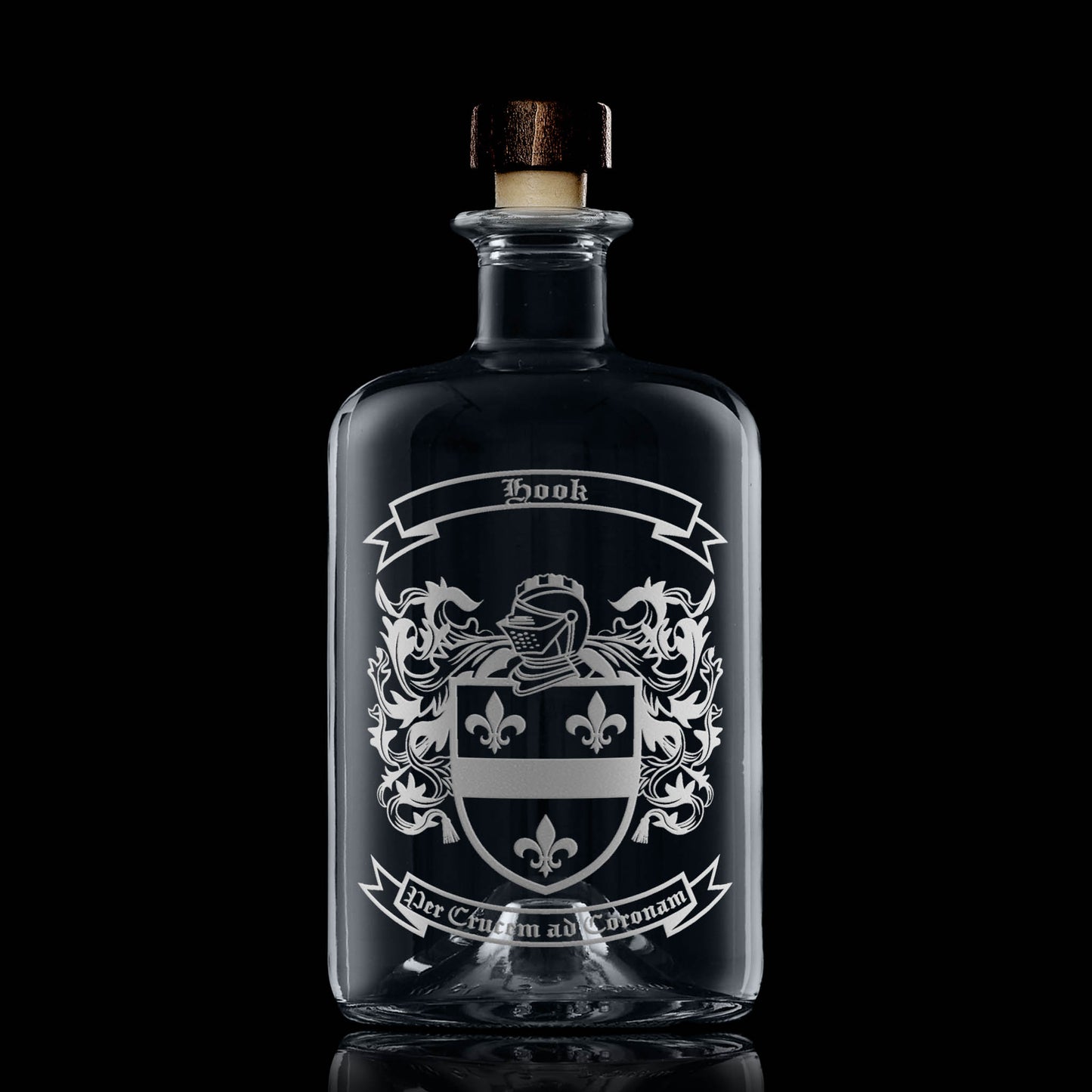Hook coat of arms on apothecary-style spirit decanter — deep sandblasted engraving, Scottish studio craftsmanship.