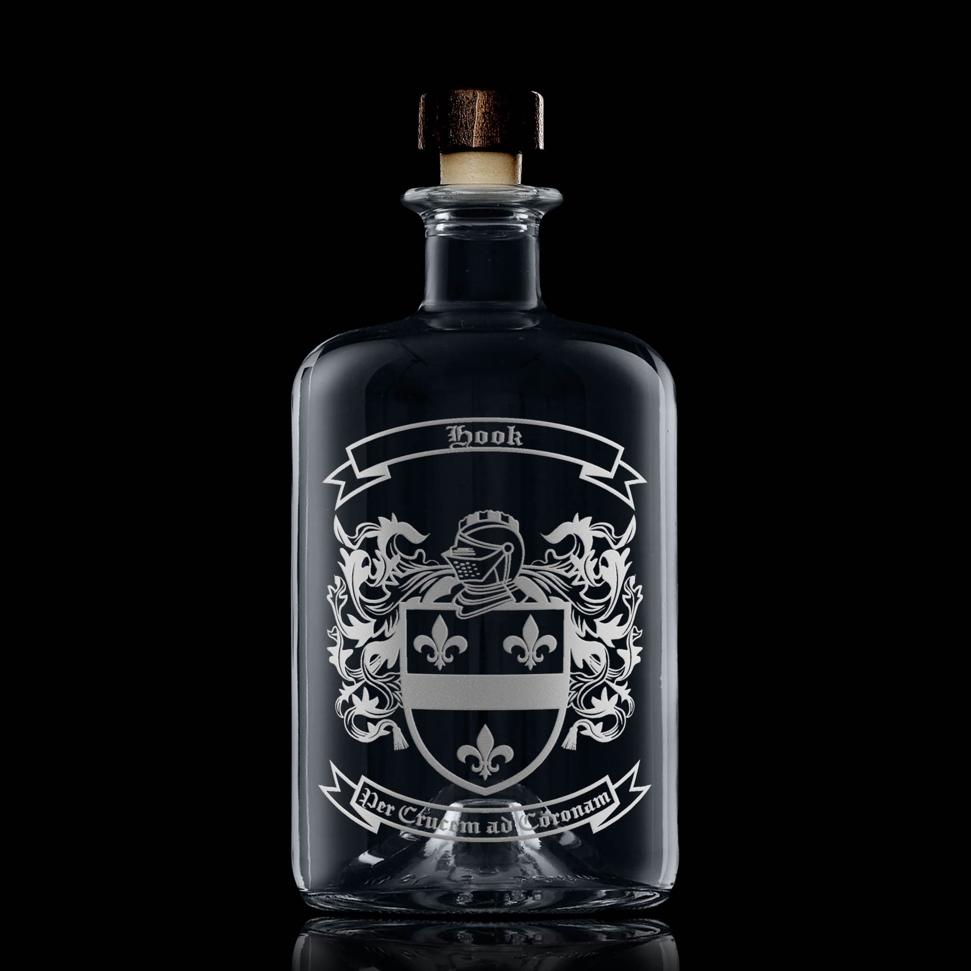 Hook coat of arms on apothecary-style spirit decanter — deep sandblasted engraving, Scottish studio craftsmanship.