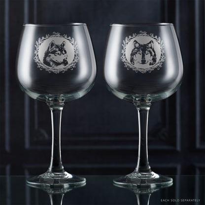 Two gin glasses with engraved husky portrait in circular frame with leafy garland