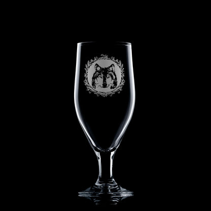 Portrait beer glass featuring and engraved Husky and leaf emblem