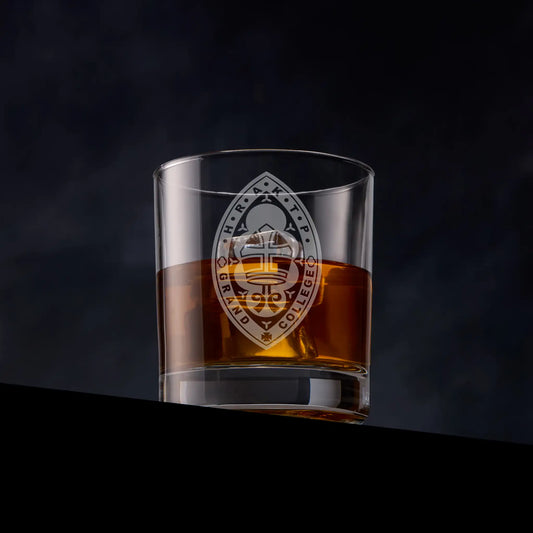 Masonic whisky tumbler with Knights Templar Priests design on a dark background