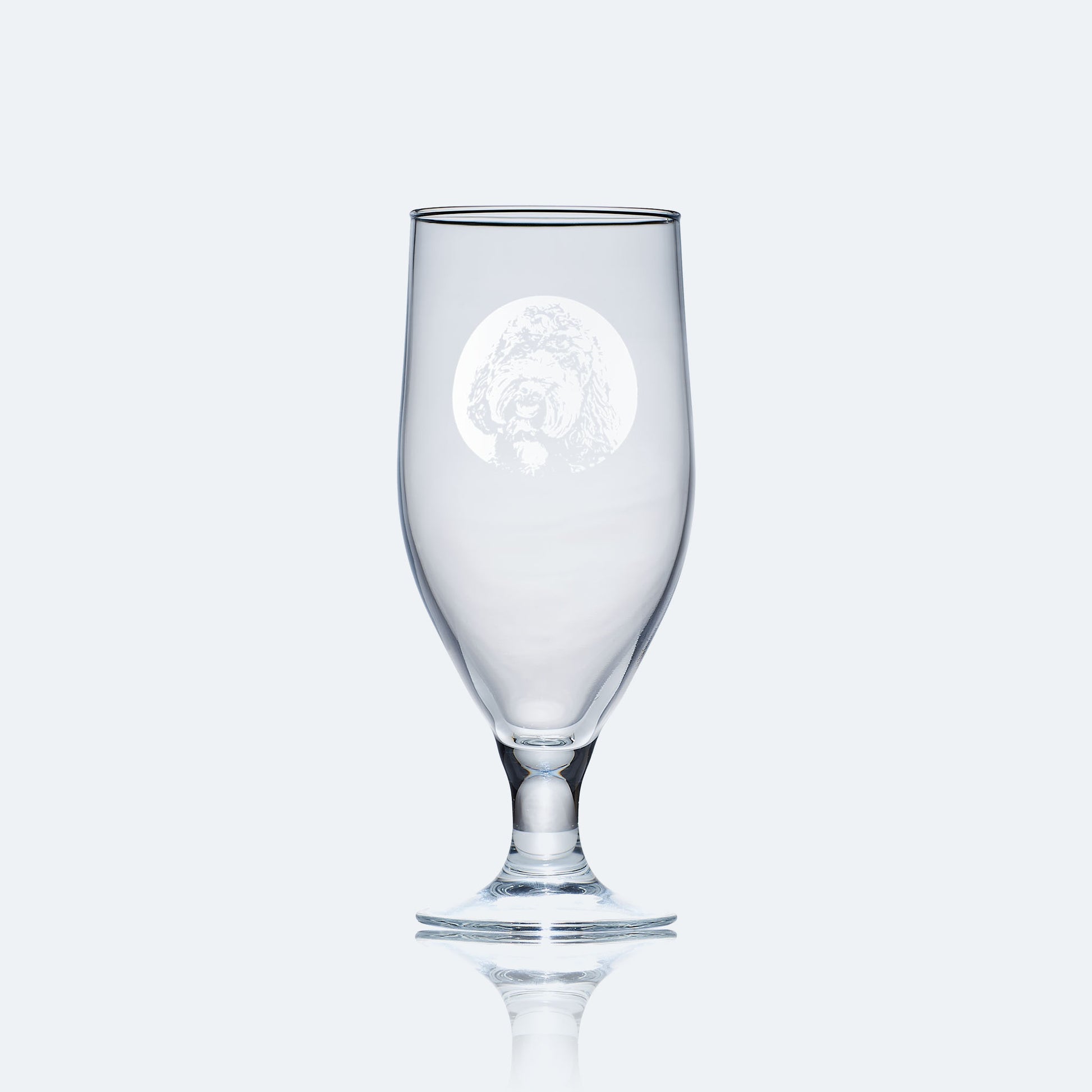 engraved chalice style stemmed beer glass etched with a portrait of a labradoodle dog