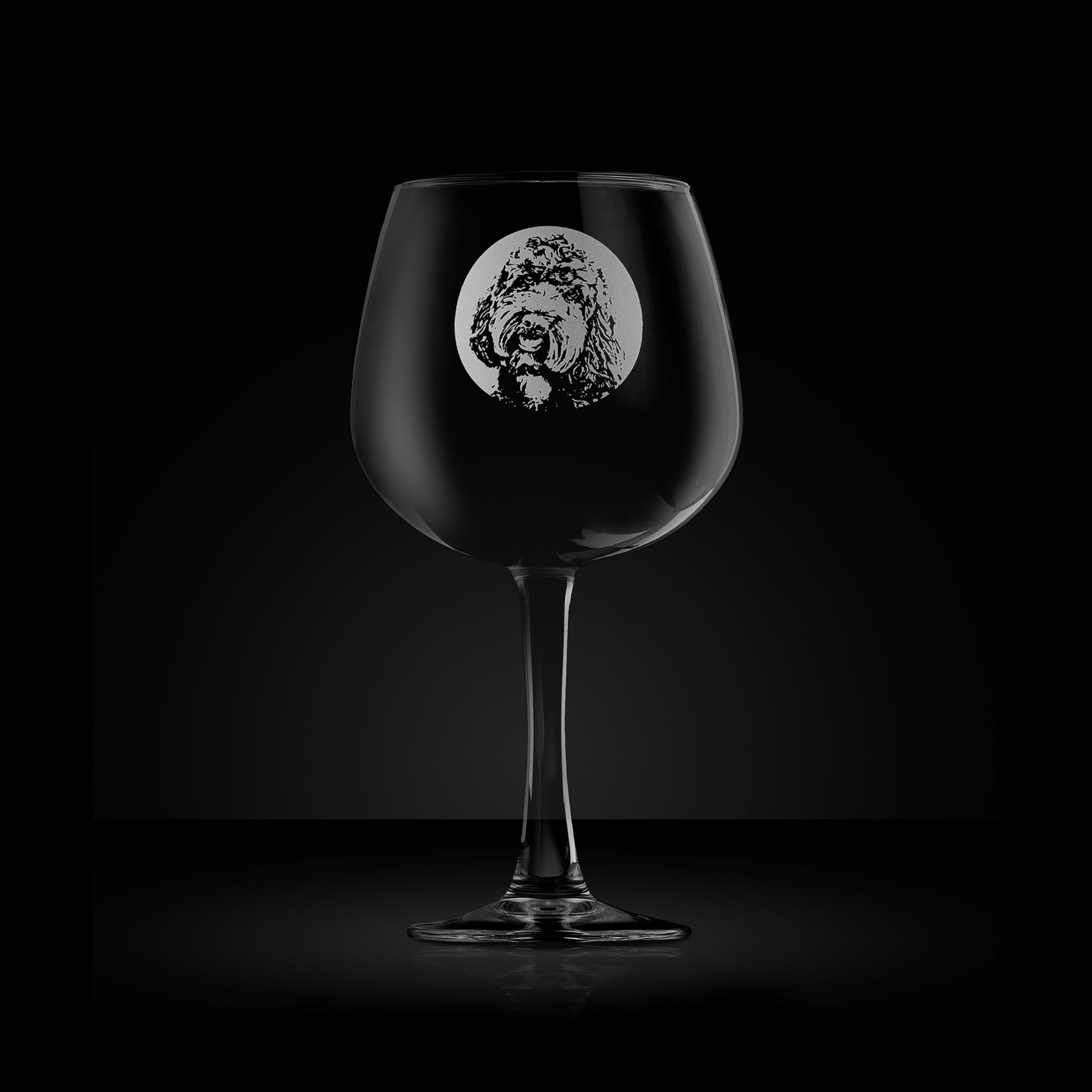 etched balloon gin glass engraved with a portrait of a labradoodle dog