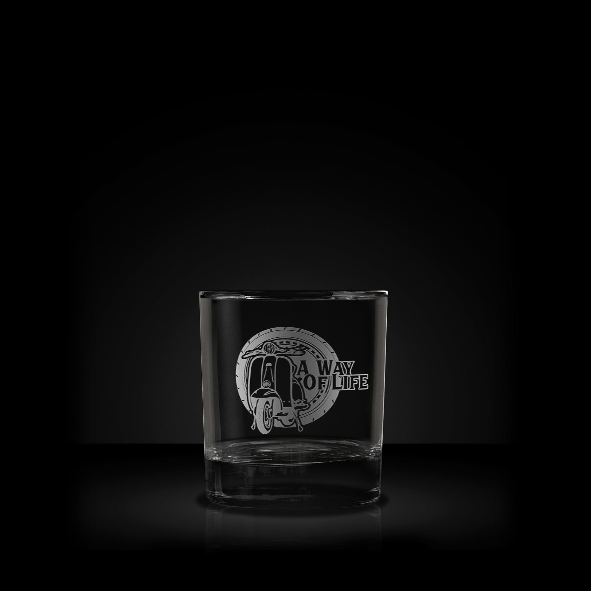 engraved whisky glass featuring a lambretta li125 scooter design