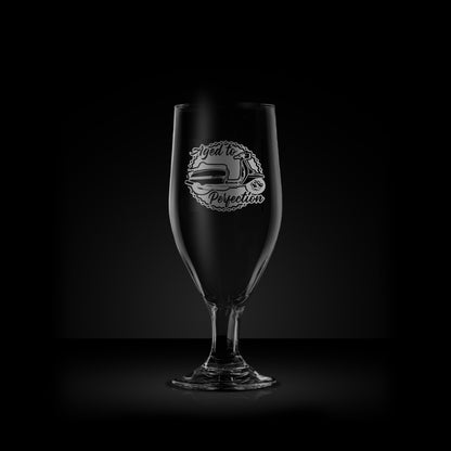 engraved stemmed beer glass featuring a lambretta gran prix scooter design