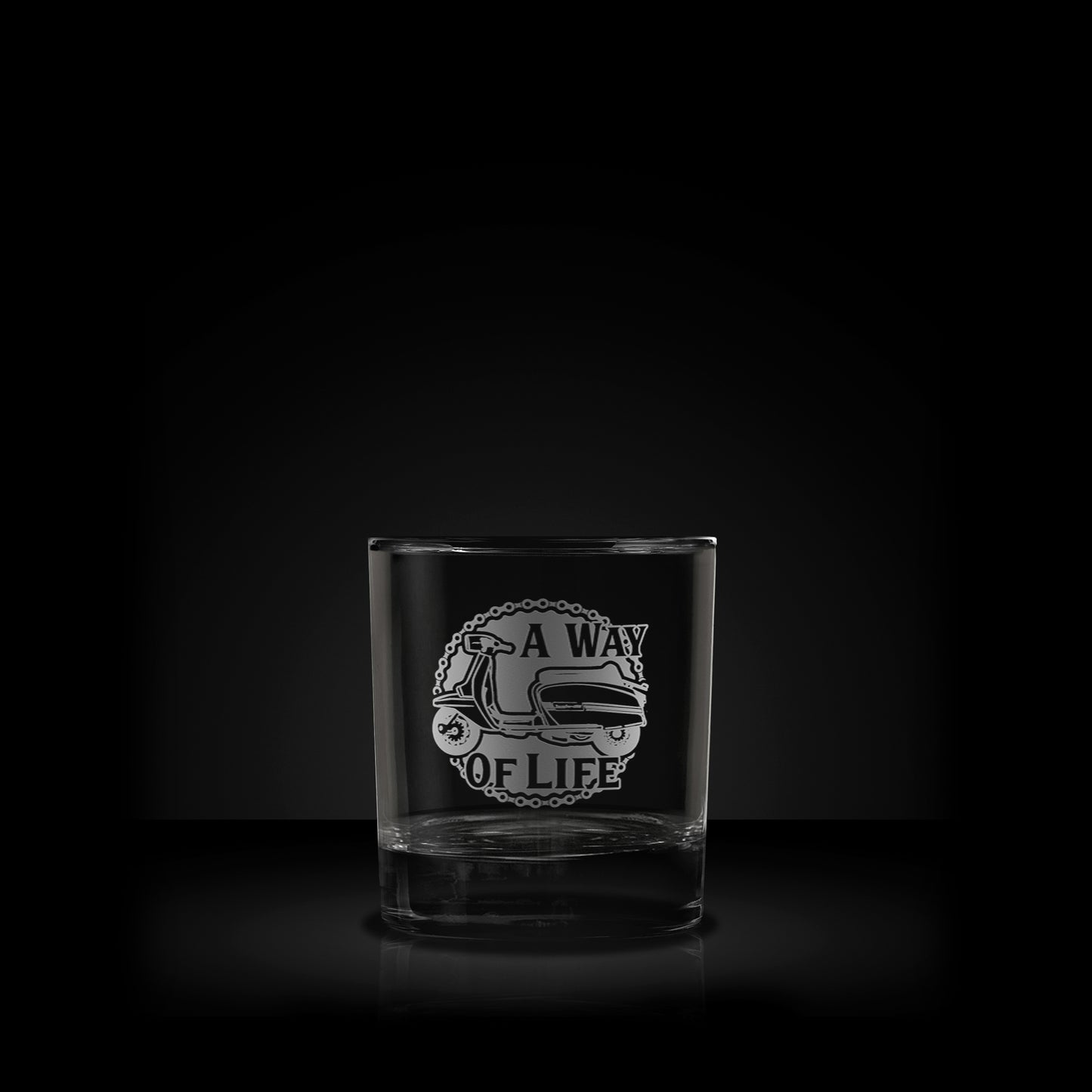 engraved whisky glass featuring a lambretta gran prix scooter design