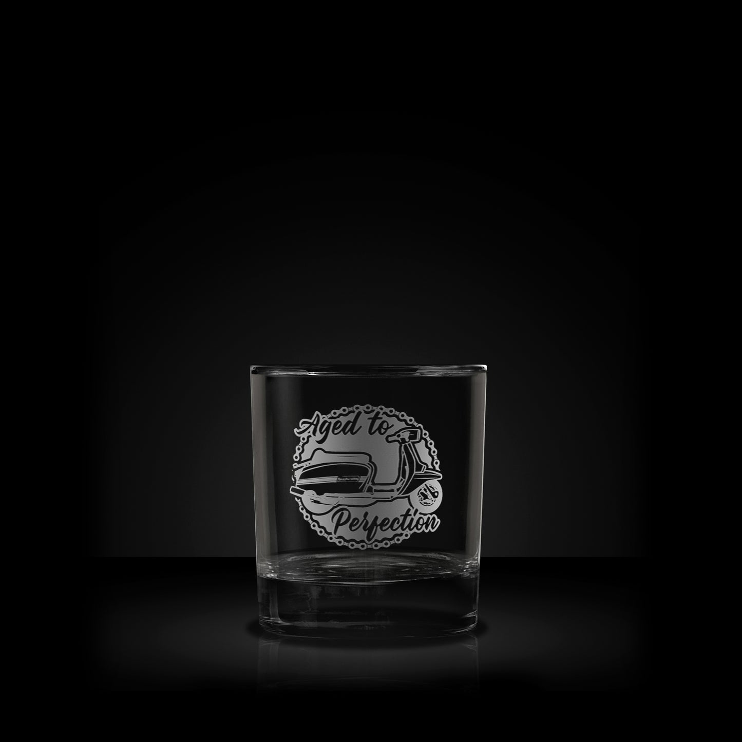 engraved whisky glass featuring a lambretta gran prix scooter design