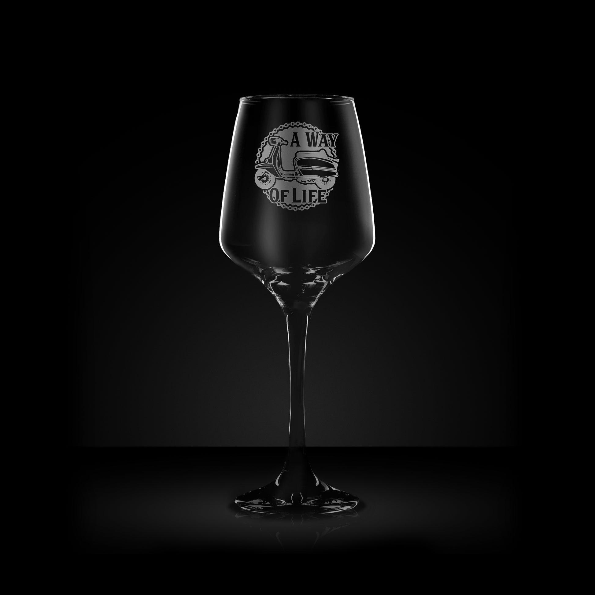 engraved wine glass featuring a lambretta gran prix scooter design