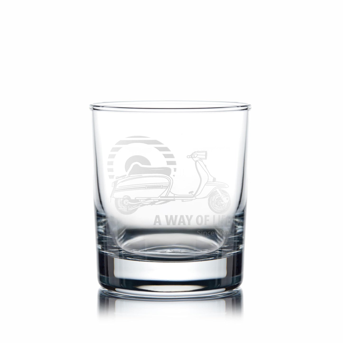 Engraved Lambretta GP whisky glass on white background showing deep detail of scooter engraving”