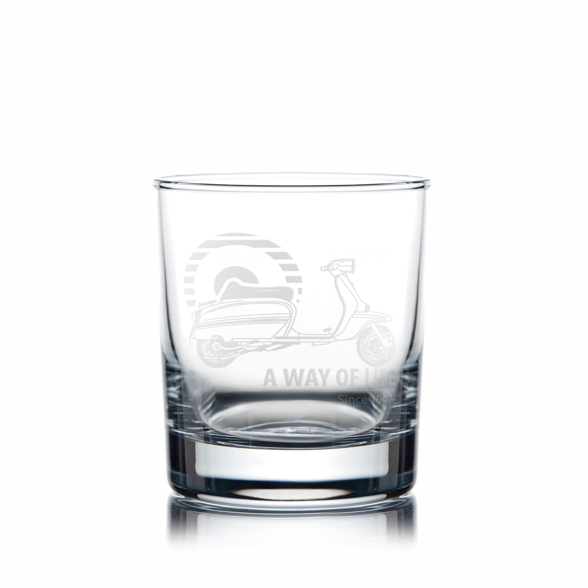 Engraved Lambretta GP whisky glass on white background showing deep detail of scooter engraving”