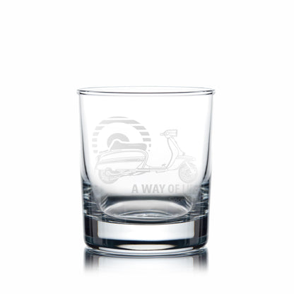Engraved Lambretta GP whisky glass on white background showing deep detail of scooter engraving”