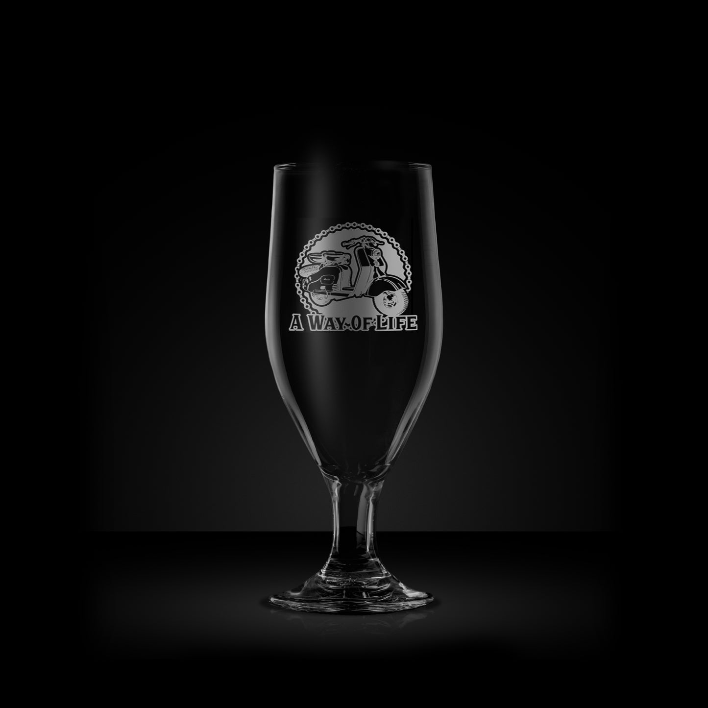 engraved stemmed beer glass featuring a lambretta ld scooter design