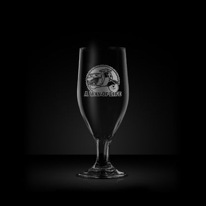 engraved stemmed beer glass featuring a lambretta ld scooter design