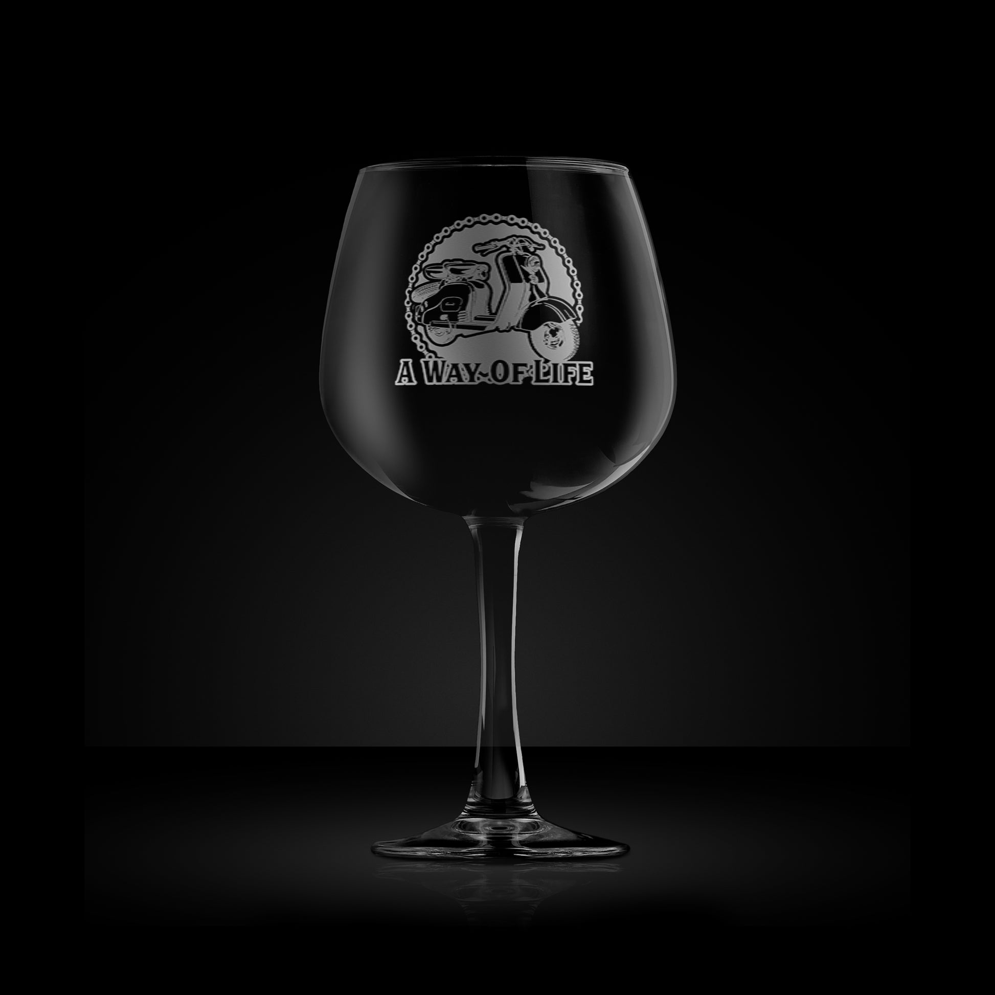 engraved gin glass featuring a lambretta ld scooter design