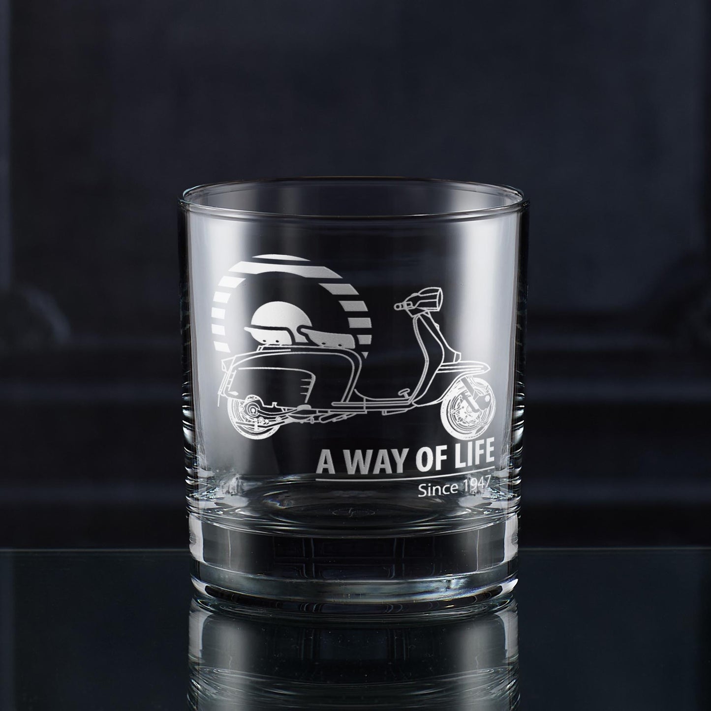 Whisky tumbler with Lambretta Li specual scooter design and 'A Way of Life' text on a dark background