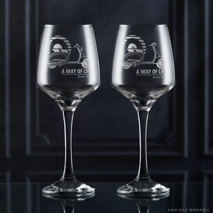 Lambretta LI Series 1 and Series 2 wine glasses engraved with scooters and Mod target, side by side on dark background