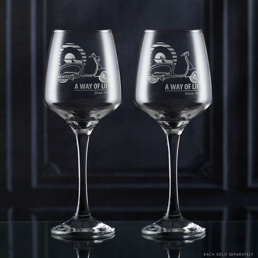 Lambretta LI Series 1 and Series 2 wine glasses engraved with scooters and Mod target, side by side on dark background