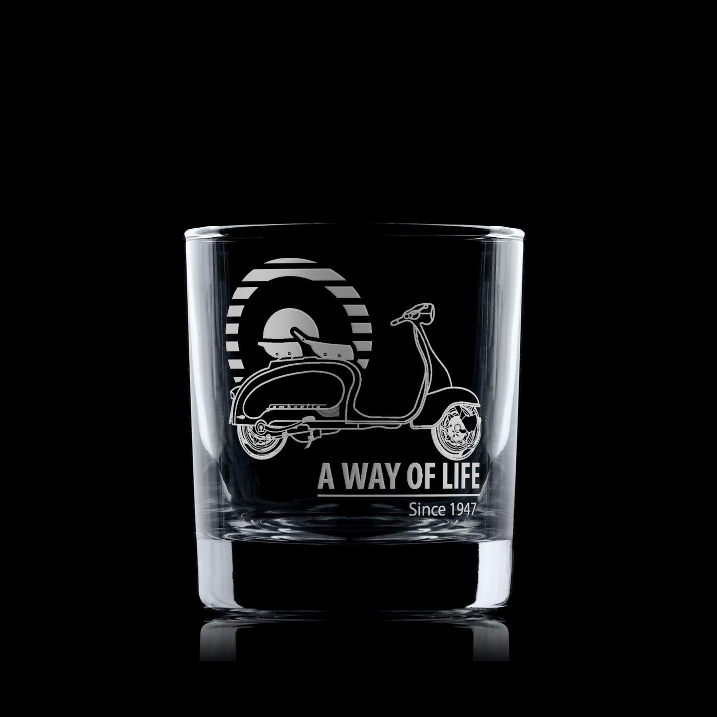 Glass tumbler engraved with vintage scooter design and 'A Way of Life Since 1947' text on a black background