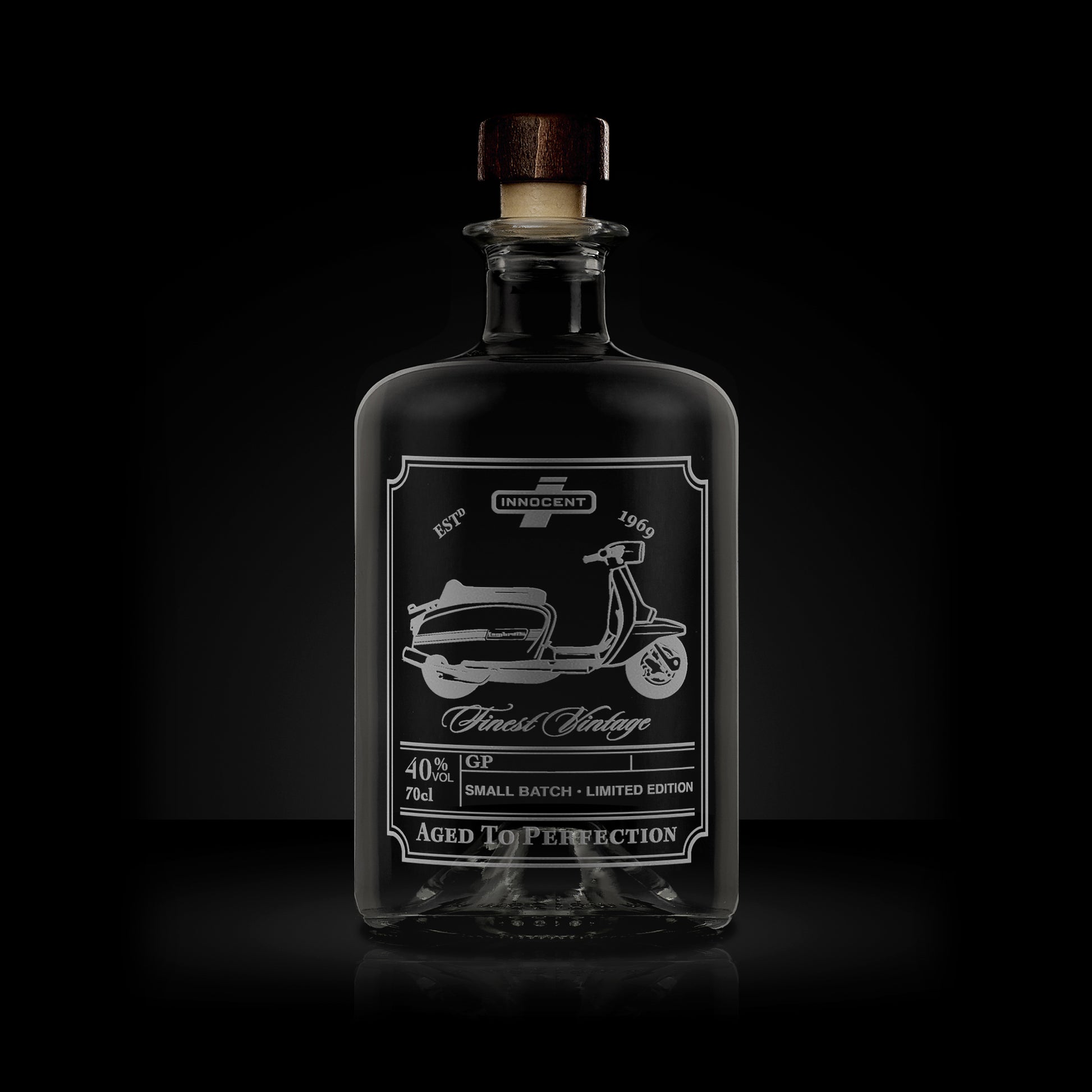 engraved whisky decanter style apothecary bottle featuring a lambretta gp scooter design