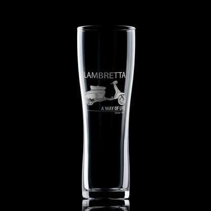 Clear glass with Lambretta scooter design on a black background