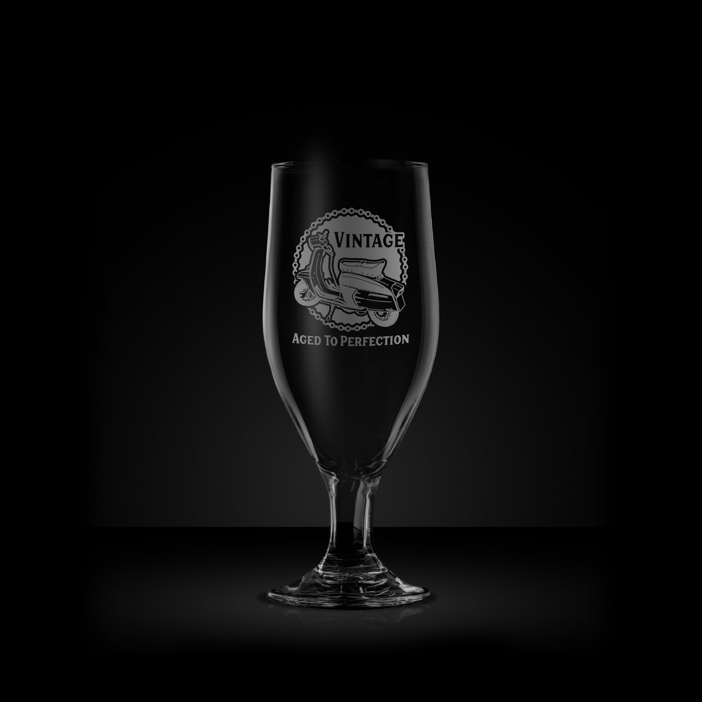 engraved stemmed beer glass featuring a lambretta sx200 scooter design