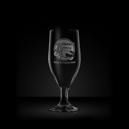 engraved stemmed beer glass featuring a lambretta sx200 scooter design