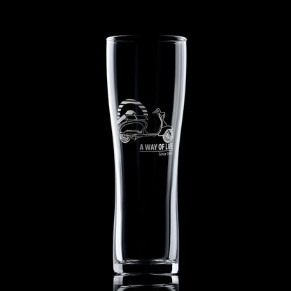 Engraved TV175 pint glass with striped Mod target, shown on dark background
