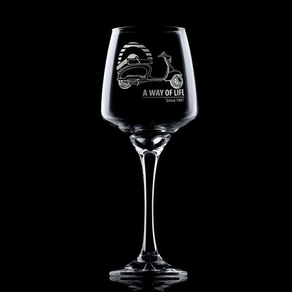 Lambretta TV175 wine glass with A Way of Life Since 1947, styled on dark background