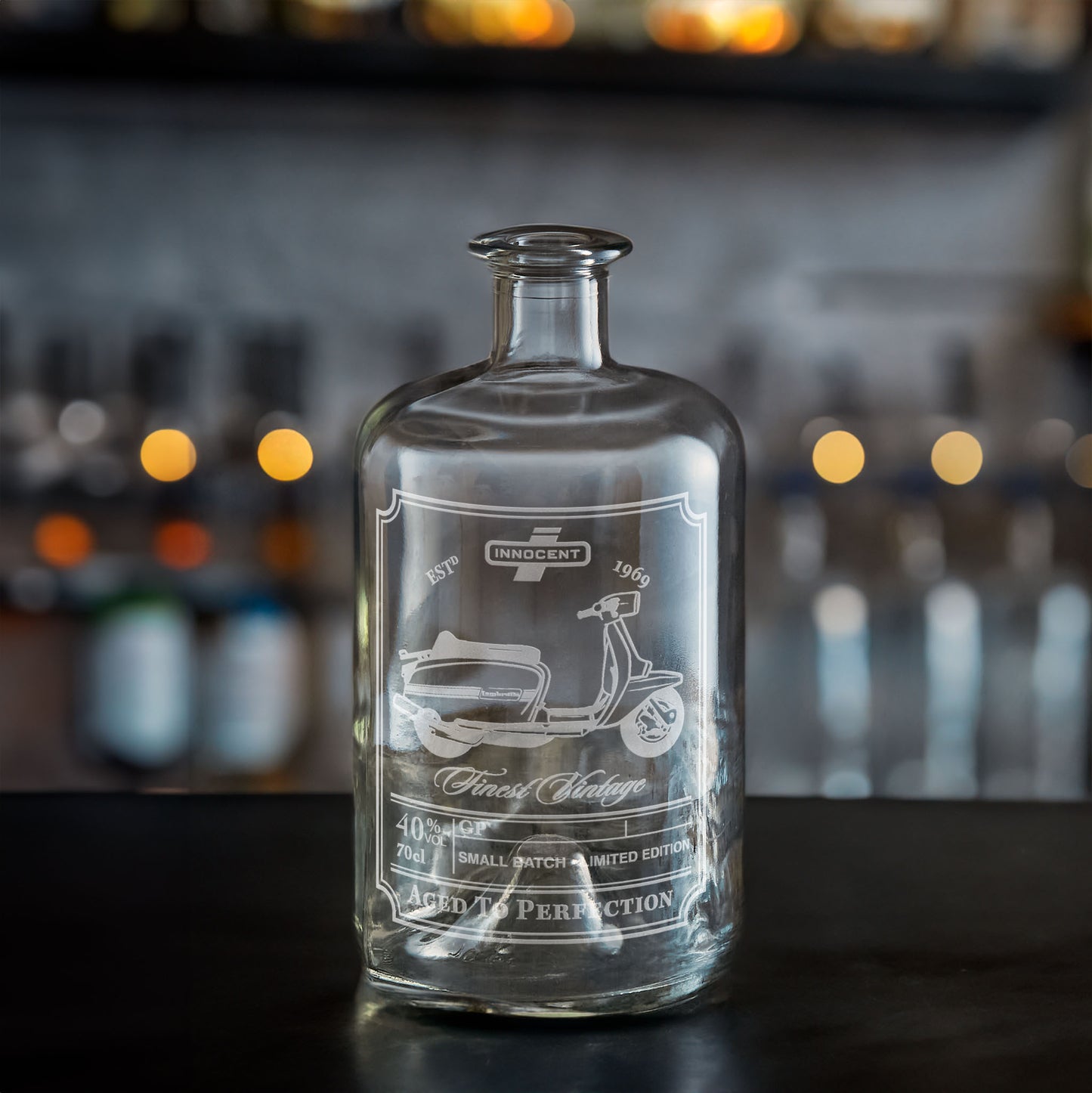 personalised engraved whisky or gin bottle etched with a lambretta gp scooter