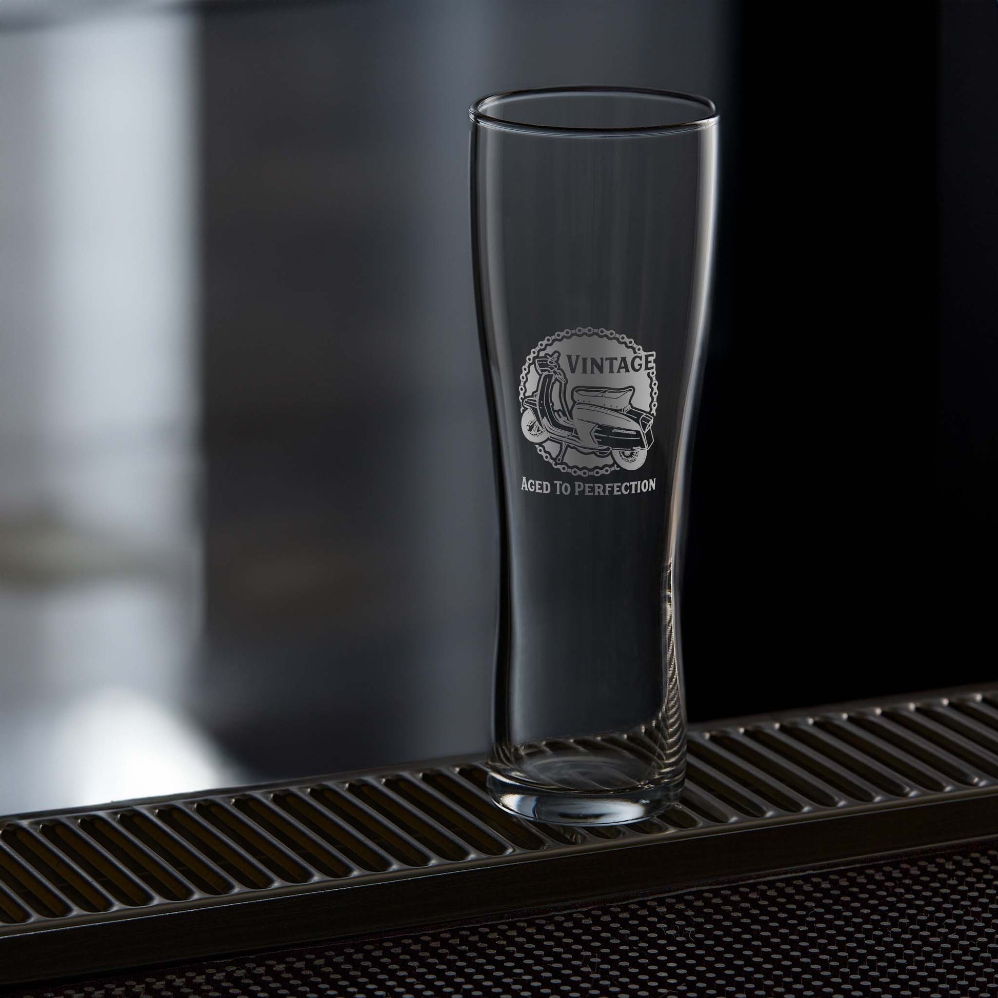 Pint glass engraved with a vintage lambretta series 3 sx200 scooter design