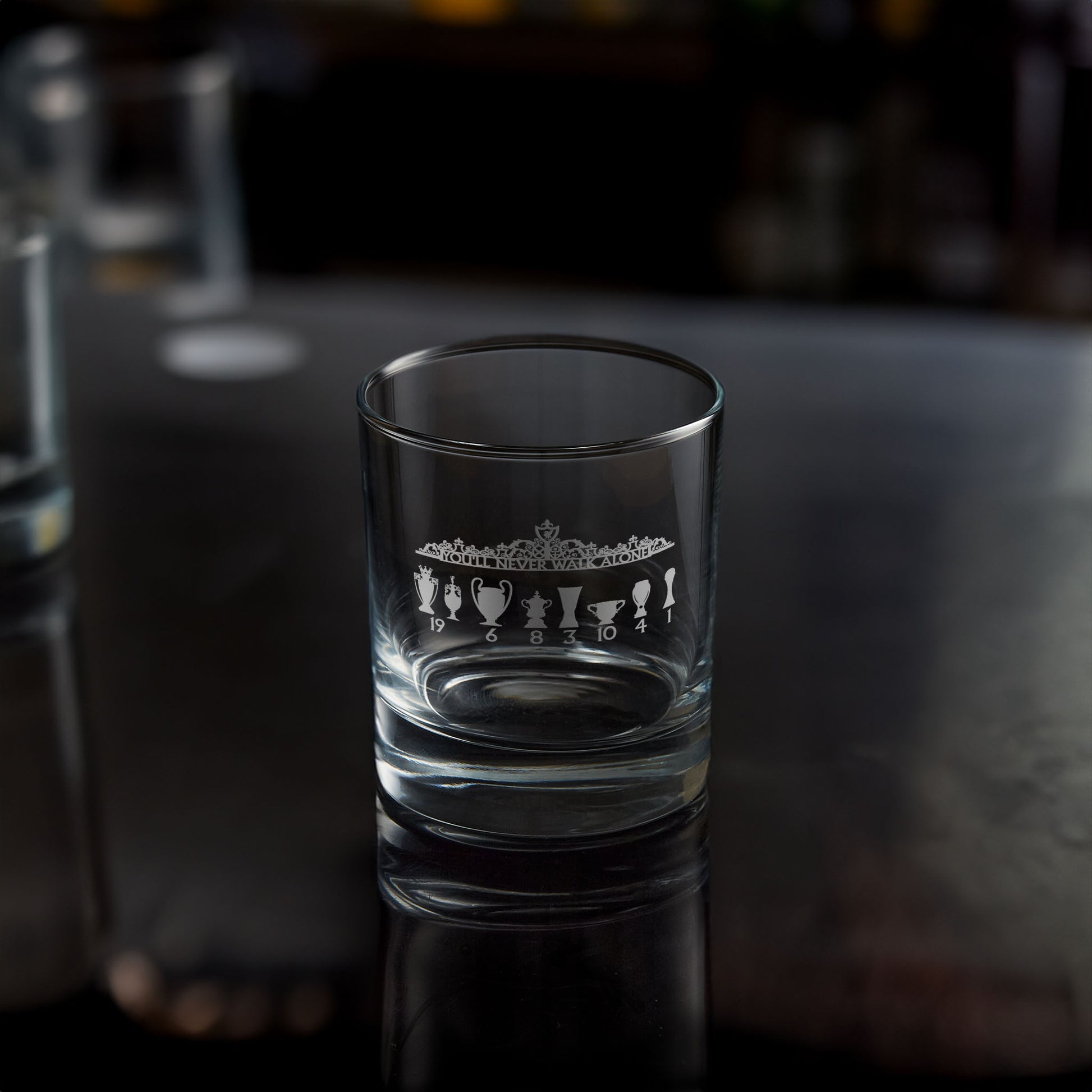 engraved whisky tumbler featuring liverpool's shankly gates and football trophy design