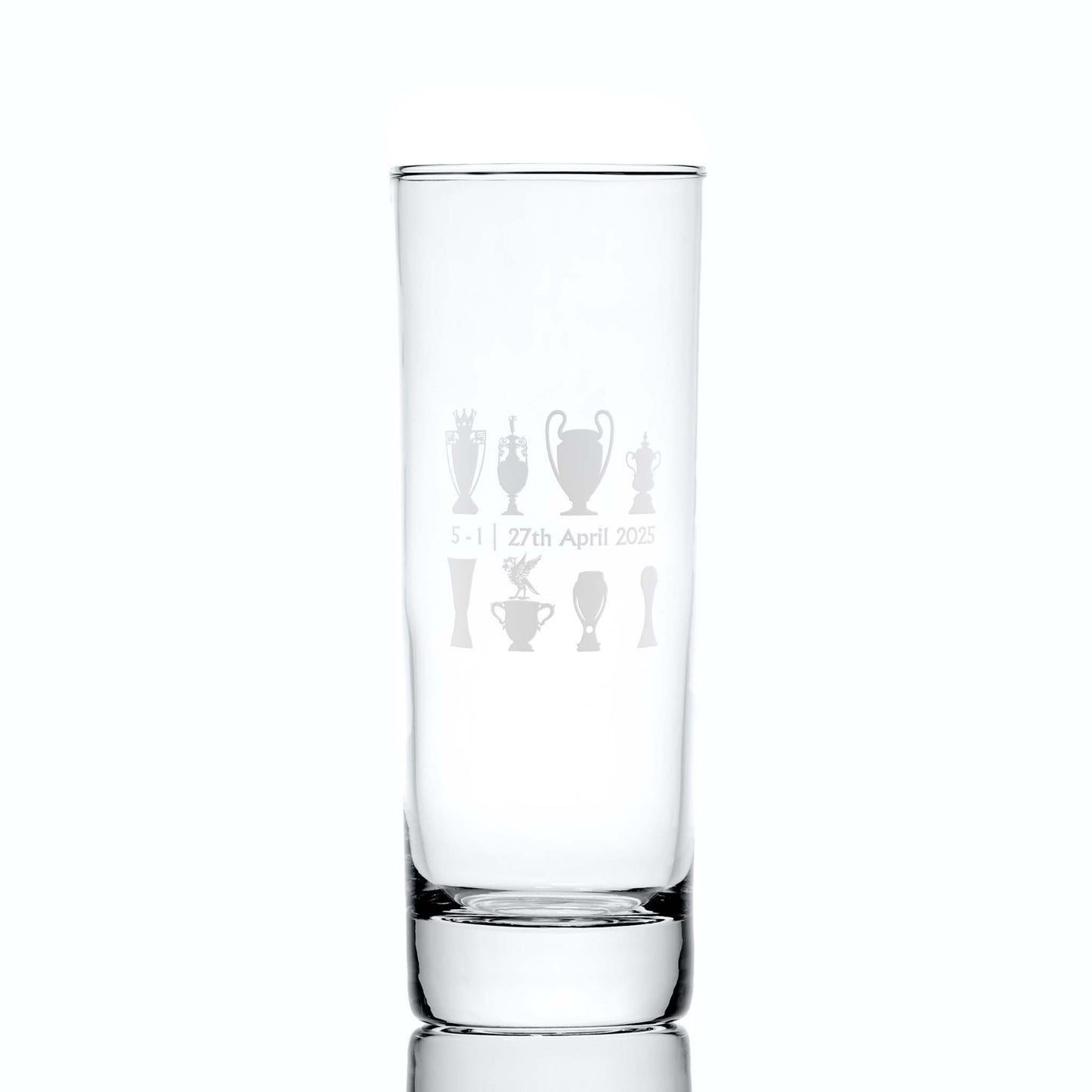 Front-facing engraved highball glass with championship trophy design, match score and Bella the Liverbird, photographed on white background