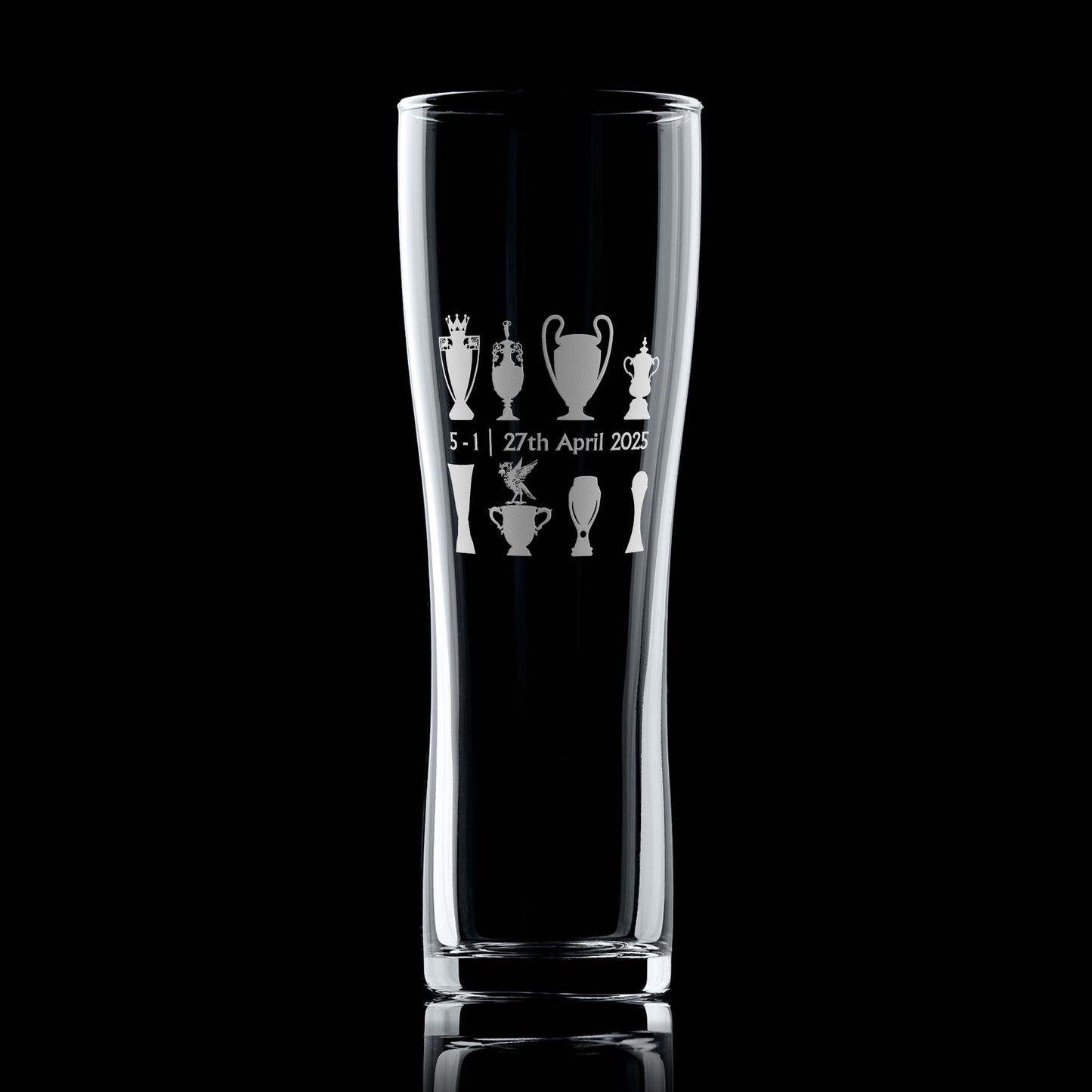 Engraved pint glass with trophy line-up and Liver Bird design, photographed front-facing on a black background