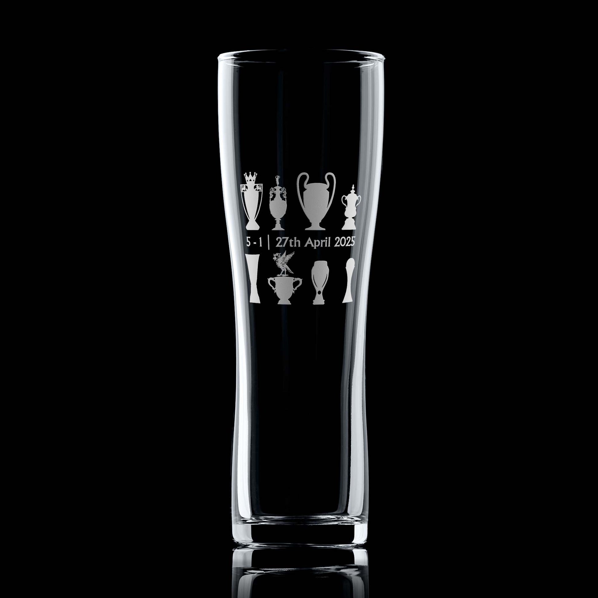 Engraved pint glass with trophy line-up and Liver Bird design, photographed front-facing on a black background